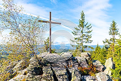 White Rock, Czech: Bila skala, rocky summit with wooden cross near Prichovice, Czech Republic Stock Photo