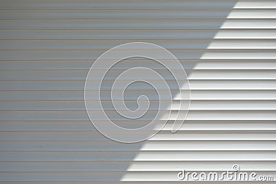 White roller shutter door closed security in modern house Stock Photo