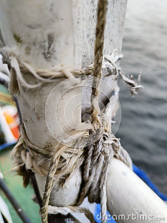 white rope with a binding fiber that binds on the boat 33 Stock Photo