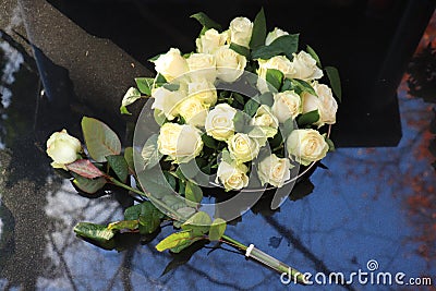 Funeral flowers on a tomb Stock Photo