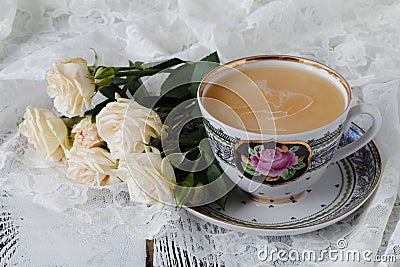 White roses and cups Stock Photo