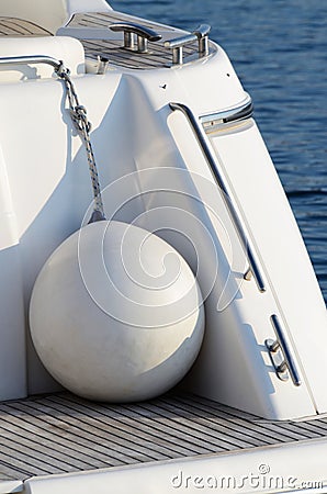 White round boat fenders for motor yacht Stock Photo