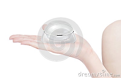 White rounded cosmetic jar on hand Stock Photo