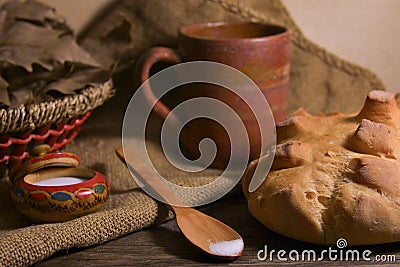 White rural bread on a wooden table Stock Photo