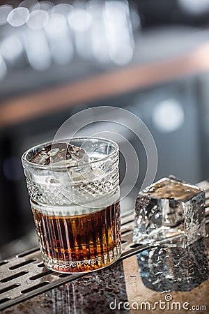 White russian cocktail drink at barcounter in night club or restaurant Stock Photo