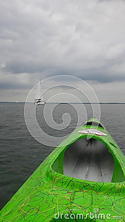 Sailboat as seen from a kayak in Masuria, Poland Stock Photo