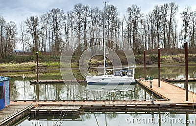 White sailboat moored in a river, Oregon. Stock Photo