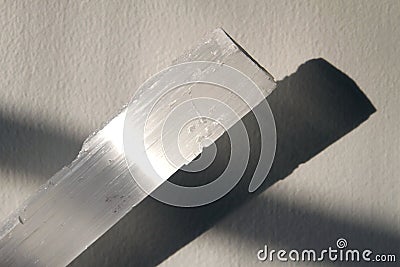 White Selenite Crystal with Light and Shadow Stock Photo