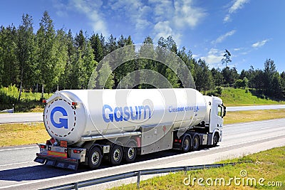 White Semi Tanker Truck Hauls LNG Editorial Stock Photo