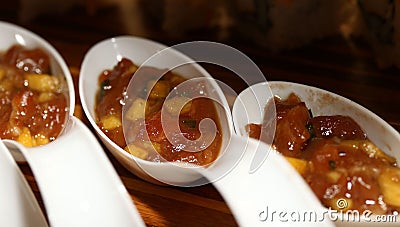 Asian Vegetables with brown sauce in with spoons Stock Photo