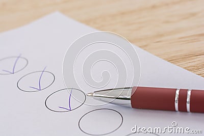 Checked list with ballpoint pen and copy space for further processing Stock Photo