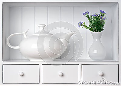 White shelf with vintage porcelain tableware Stock Photo