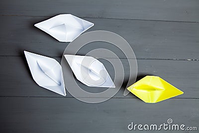 white ships follow yellow Stock Photo