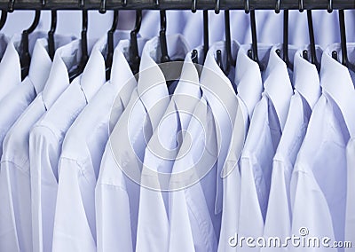 White shirt with cloth hanger for sale Stock Photo