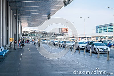 The taxi stand in front of Prague International Airport on a bright sunny day with lots of Taxis waiting outside Editorial Stock Photo