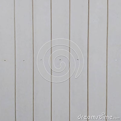 White slatted fence. The surface of the white slat fence. Building slat fence in the construction area Stock Photo