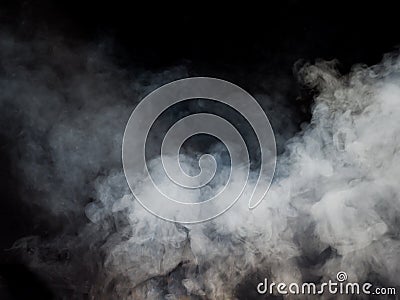 White smoke rises from below Stock Photo