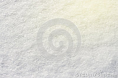 White snow shining in the sun close-up texture natural background, toned Stock Photo