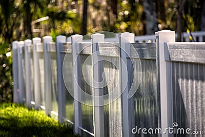 White Solid Privacy Vinyl Fence Stock Photo