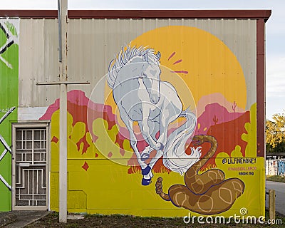 White Stallion and Rattlesnake mural by Brooklynd Turner for the 2020 Wild West Mural Fest in West Dallas, Texas. Editorial Stock Photo