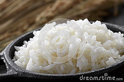White steamed rice in black round pot Stock Photo