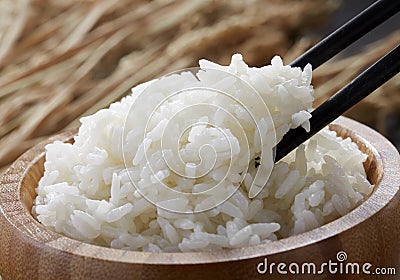 White steamed rice in wooden bowl Stock Photo