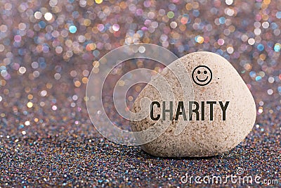 Charity on stone Stock Photo