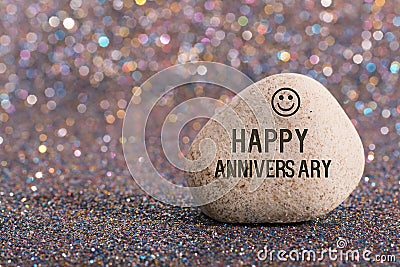 Happy anniversary on stone Stock Photo