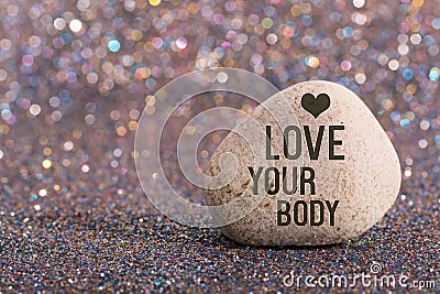 Love your body on stone Stock Photo