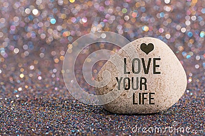 Love your life on stone Stock Photo
