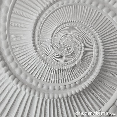 White stucco moulding plasterwork spiral abstract fractal pattern background. Plaster abstract spiral effect background element Stock Photo