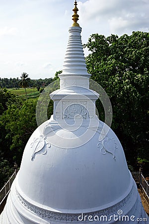White stupa on the rock Editorial Stock Photo