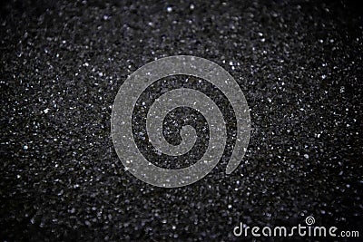 White sugar flakes turn into black scales that are color-coded with a photo editor. black color background Stock Photo