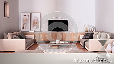 White table or shelf with crystal hourglass measuring the passing time over cosy dove gray and beige living room with sofa, Stock Photo