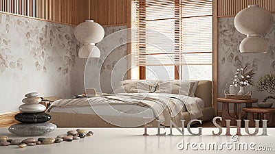 White table shelf with pebble balance and 3d letters making the word feng shui over modern japandi bedroom with double bed and Stock Photo