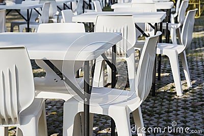 White tables and chairs in festival Stock Photo