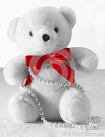 White Teddy Bear with Pearls Stock Photo