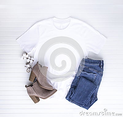 White tee mockup - tshirt with cotton balls, boots & jeans Stock Photo