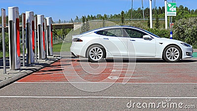 White Tesla Model S Electric Car Charging Battery Editorial Stock Photo