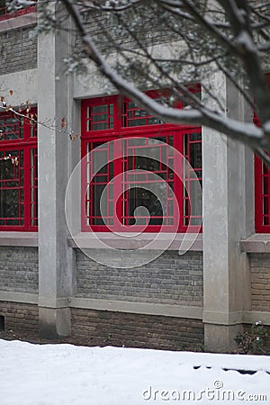 White thick snow on the ground, red beautiful Chinese-style windows Stock Photo