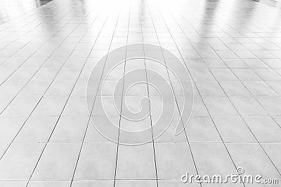 White Tiles marble floor background/White tiles floor texture office With the morning sun, the windows reflect the reflection. Stock Photo