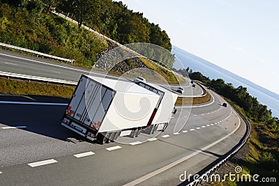 White truck on a beautyful driving route Stock Photo