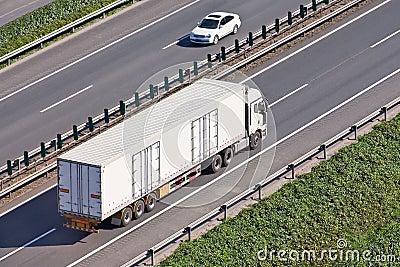 White truck on an expressway Stock Photo