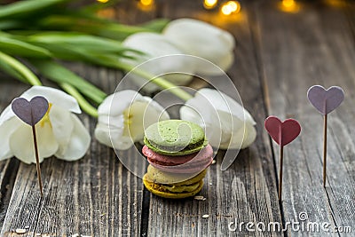 white tulips and macaroons Stock Photo