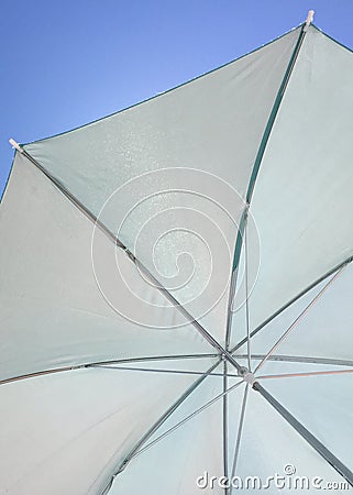 White umbrella blue sky Stock Photo