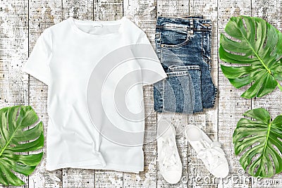 White unisex tshirt shirt mockup Fashion flatlay monstera leaves Stock Photo