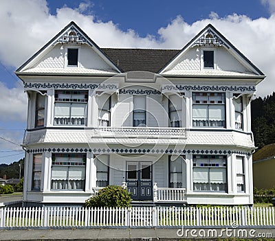 White Victorian Home Under Blue Cloudy Sky Stock Photo