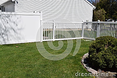 White vinyl backyard fences Stock Photo