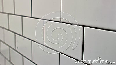 White wall, defocused view. Rectangular Tiles Stock Photo