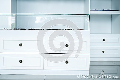 White wardrobe chest of drawers, interior dressing room, store Stock Photo